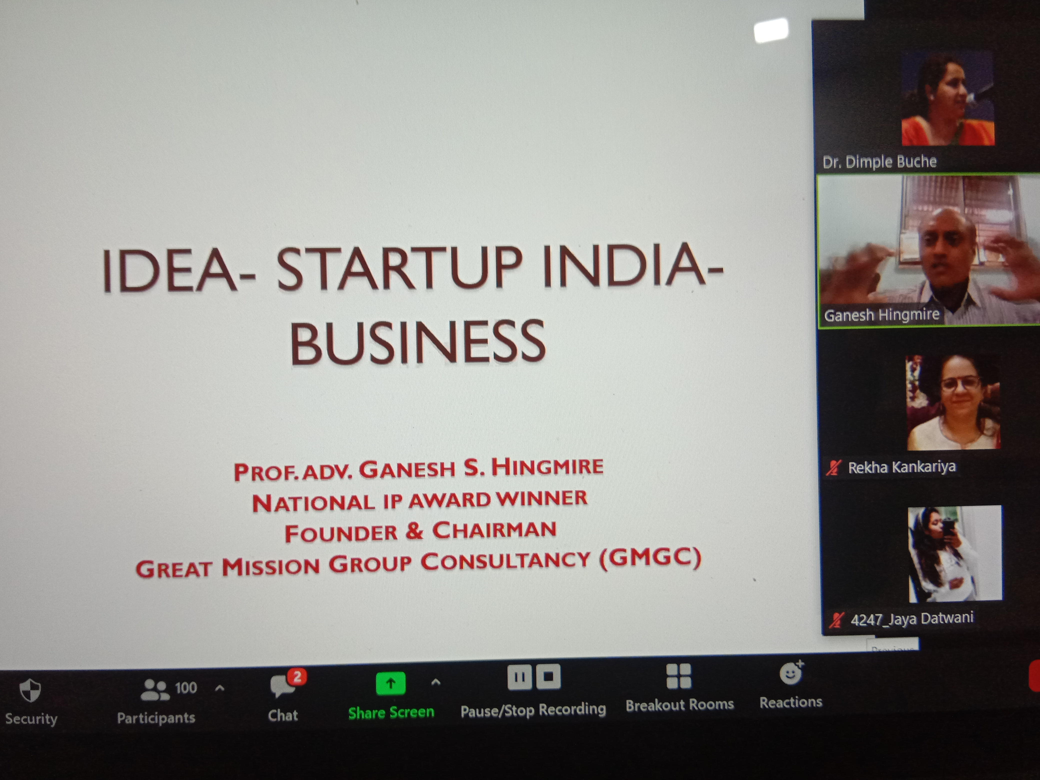 Speaker with the organizing team